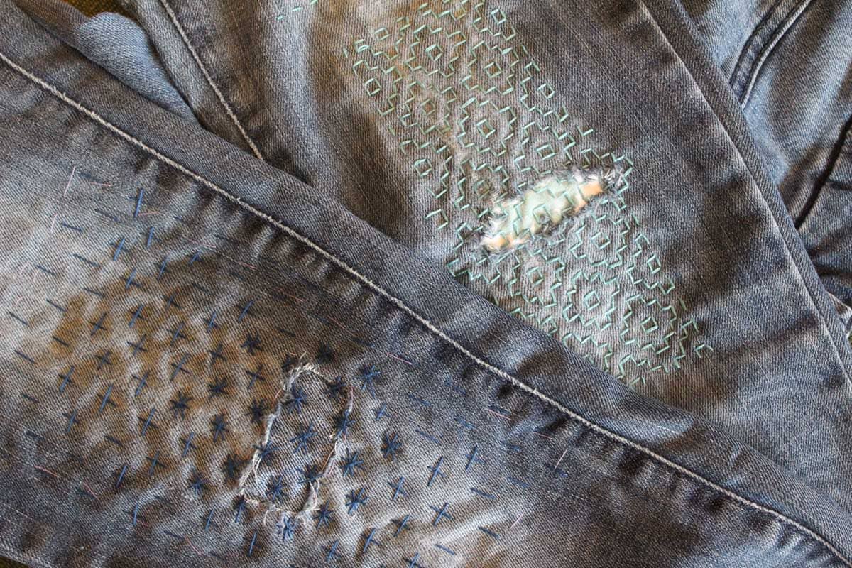 Jeans mended with sashiko embroidery